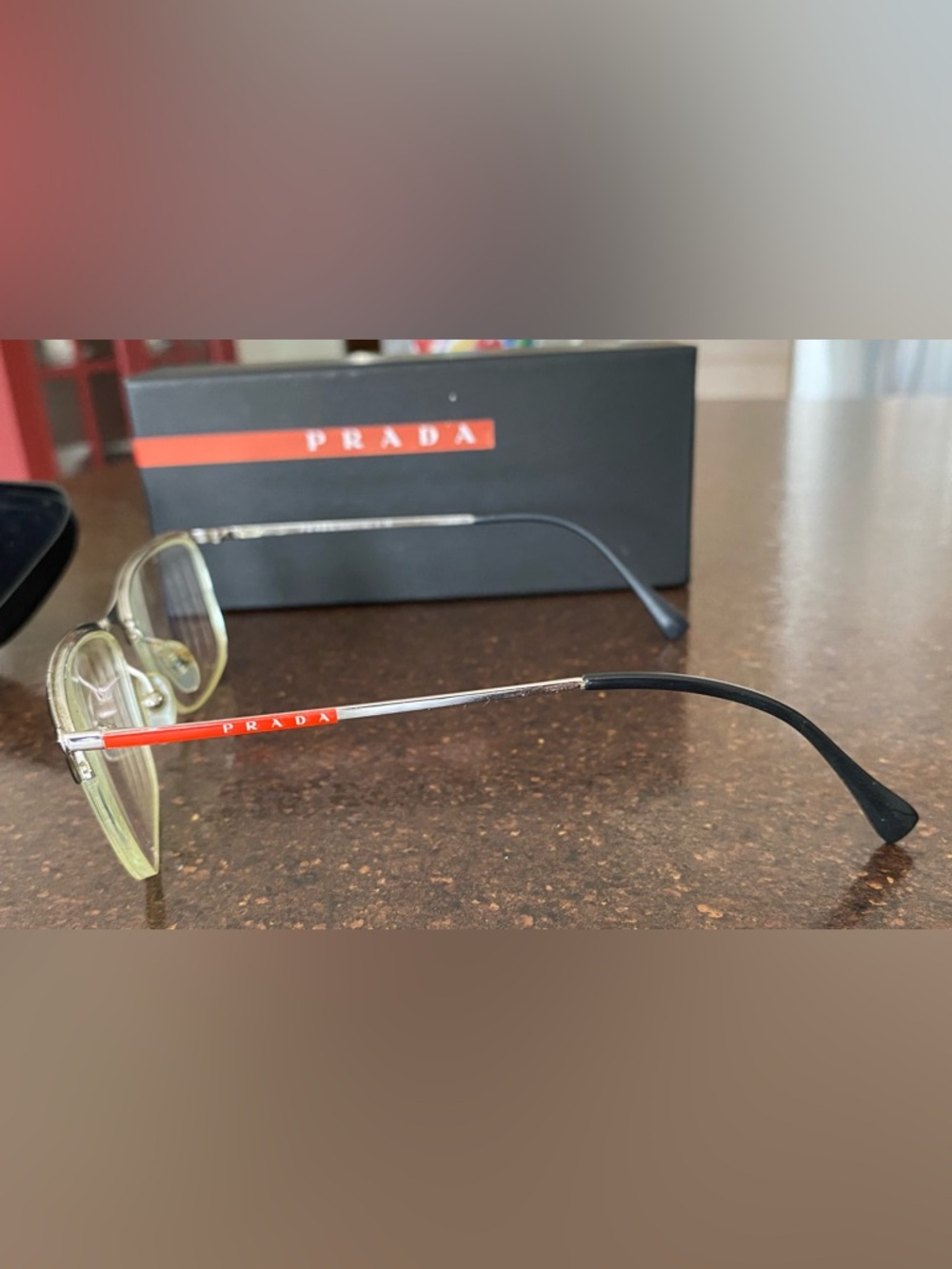 Prada Men's Eyewear Silver Frame with Red Accent